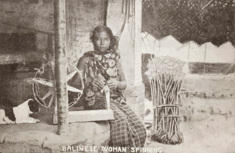Description: Balinese woman and her spinning wheel