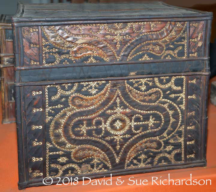 Description: Lontar palm leaf chest decorated with shells