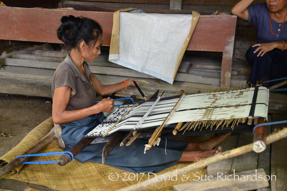 Description: Passing the weft