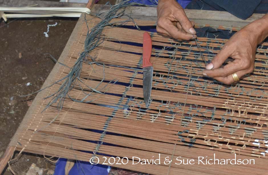 Description: The narrow woven section of warps and the grouping of the bundles into ikat bands