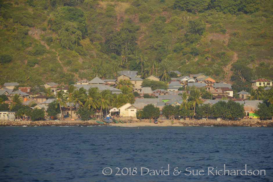 Description: The small village of Uma Pura viewed from the sea