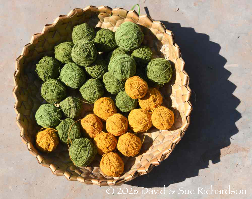 Description: Balls of cotton yarn dyed with turmeric and a chlorophyl dye.