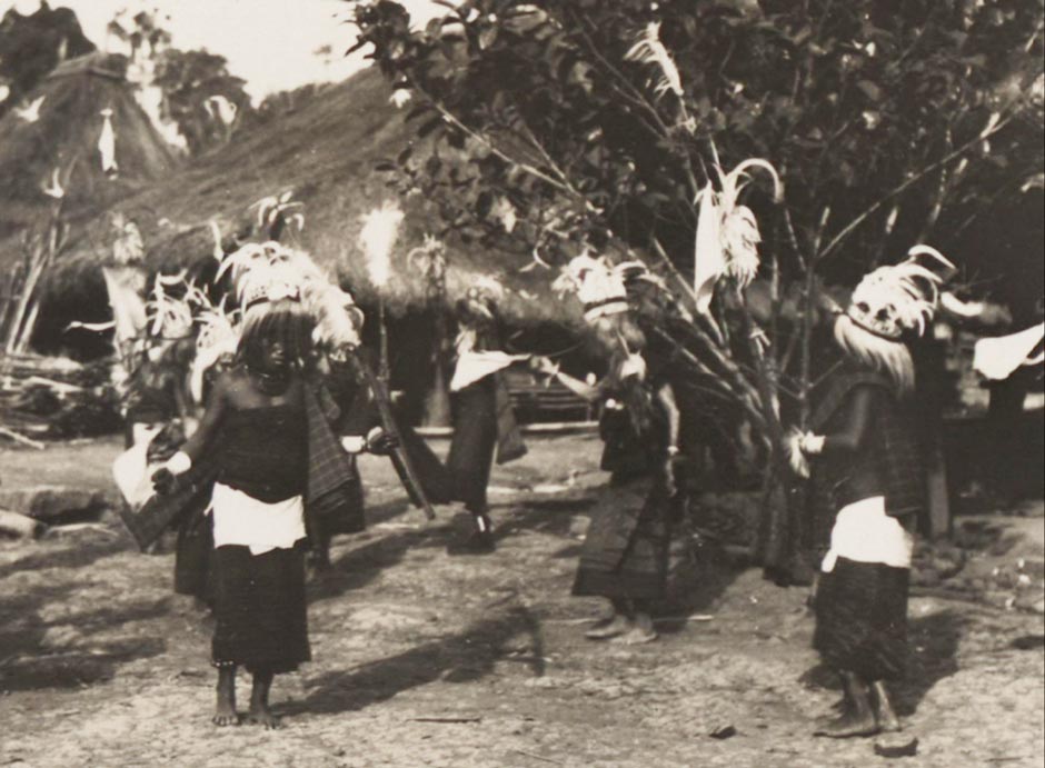 Description: Dancers in festival costumes at Wailolong