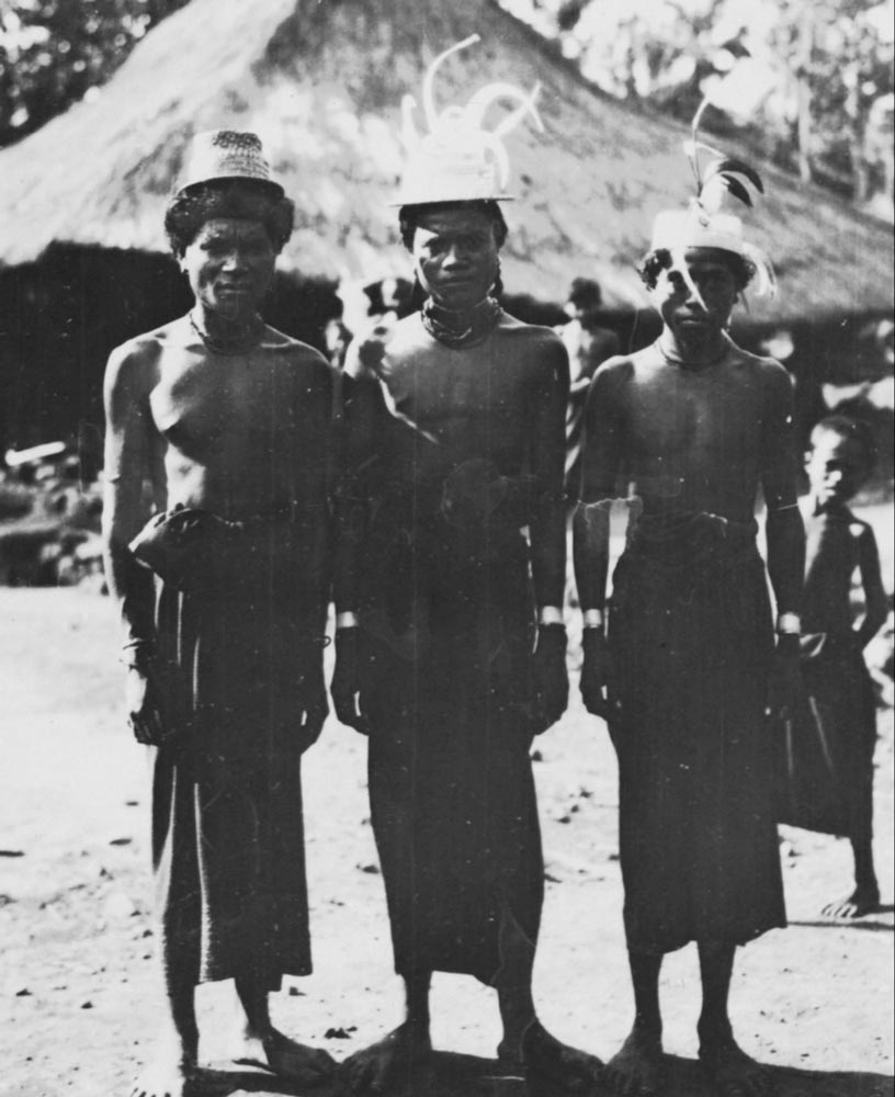 Description: Three male dancers at Lewoloba