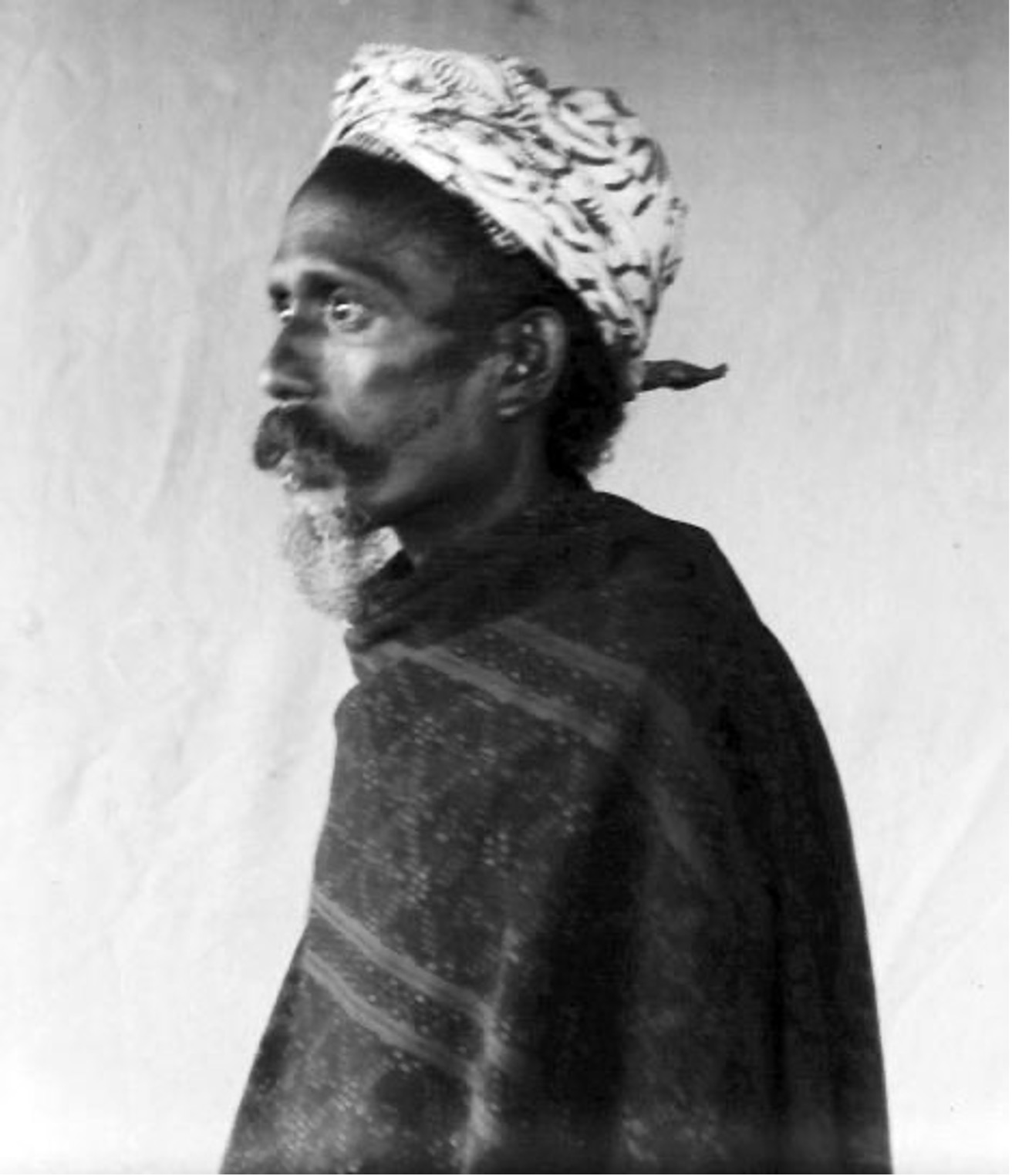 Description: Linggo Gedo, the district chief of Mbuli Wara Lau