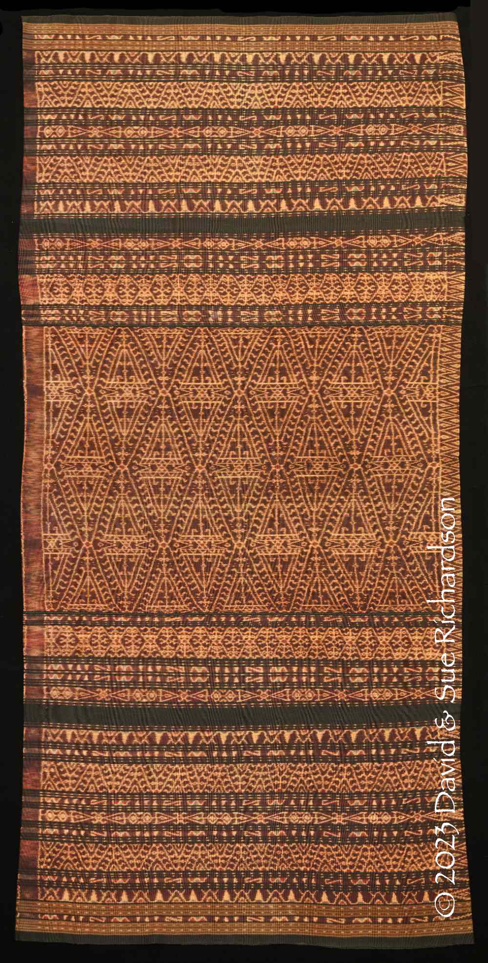 Description: A lawo kapa ria woven by Mama Fabiola Keto in 1986