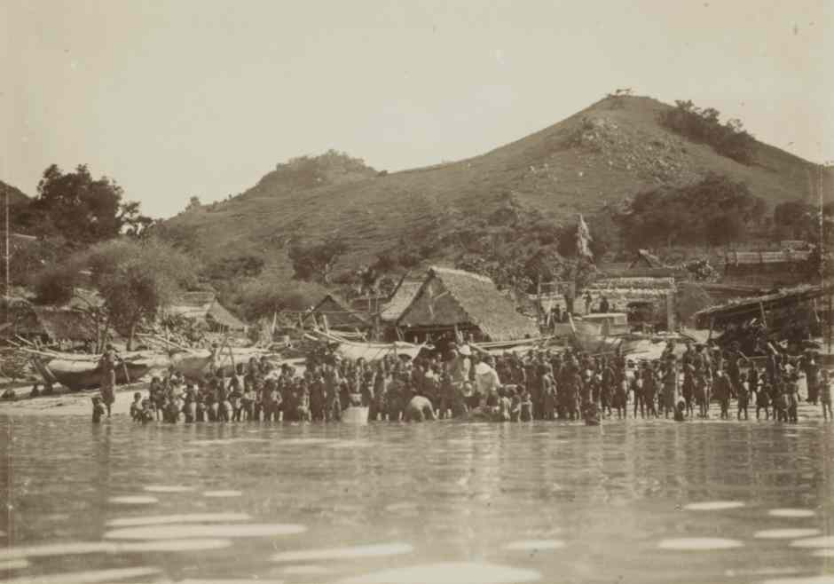 Description: Villagers on the beach at Lamakera