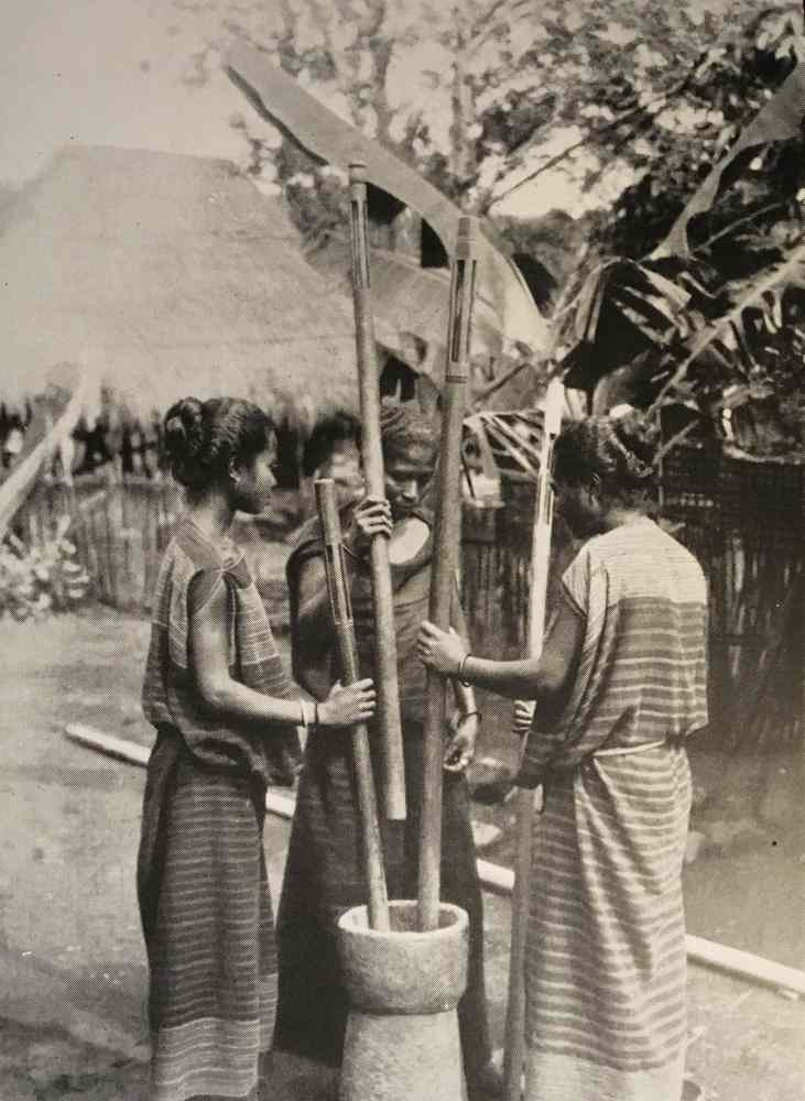 Description: Women pounding rice